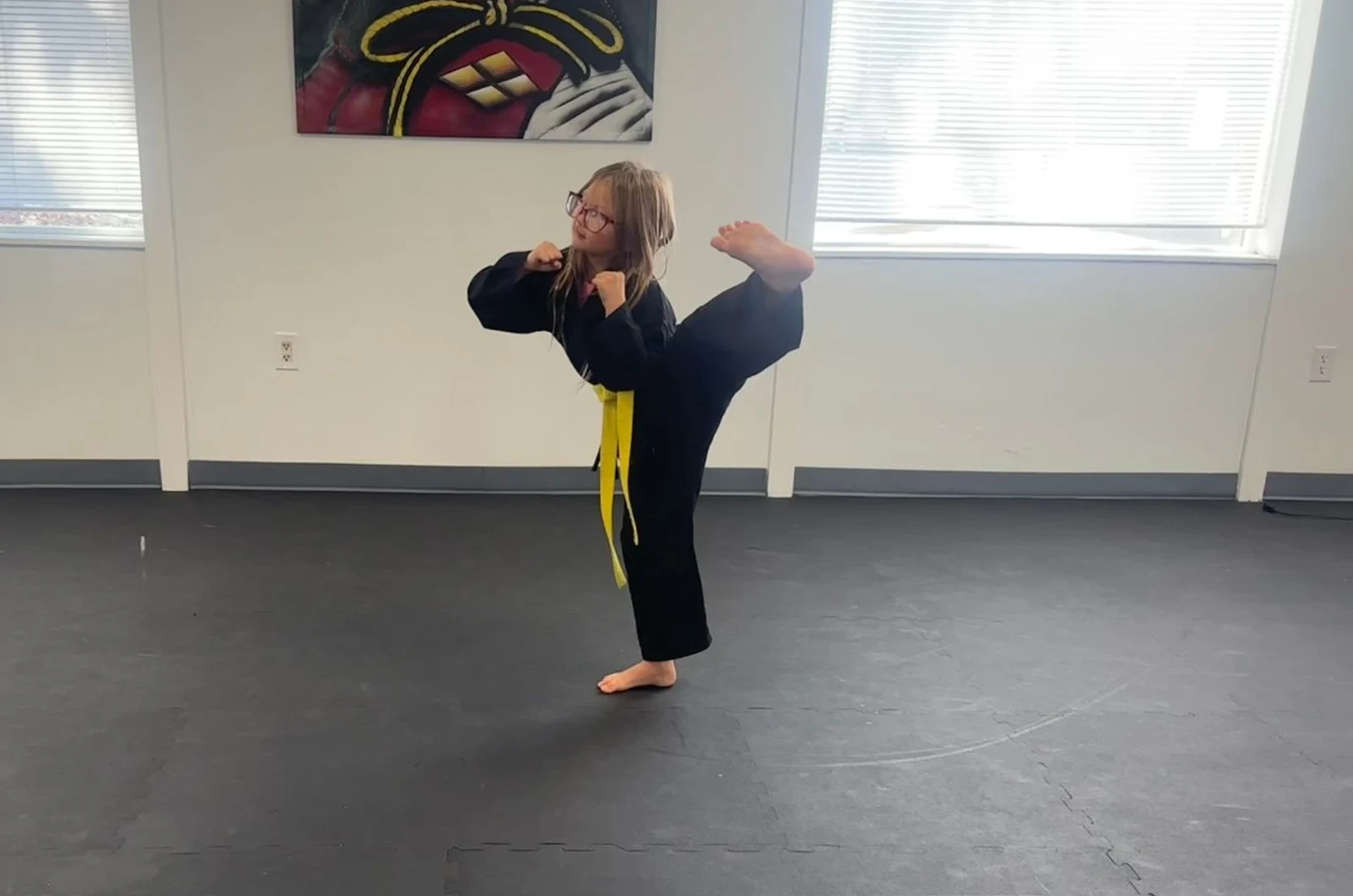 Child building confidence in martial arts